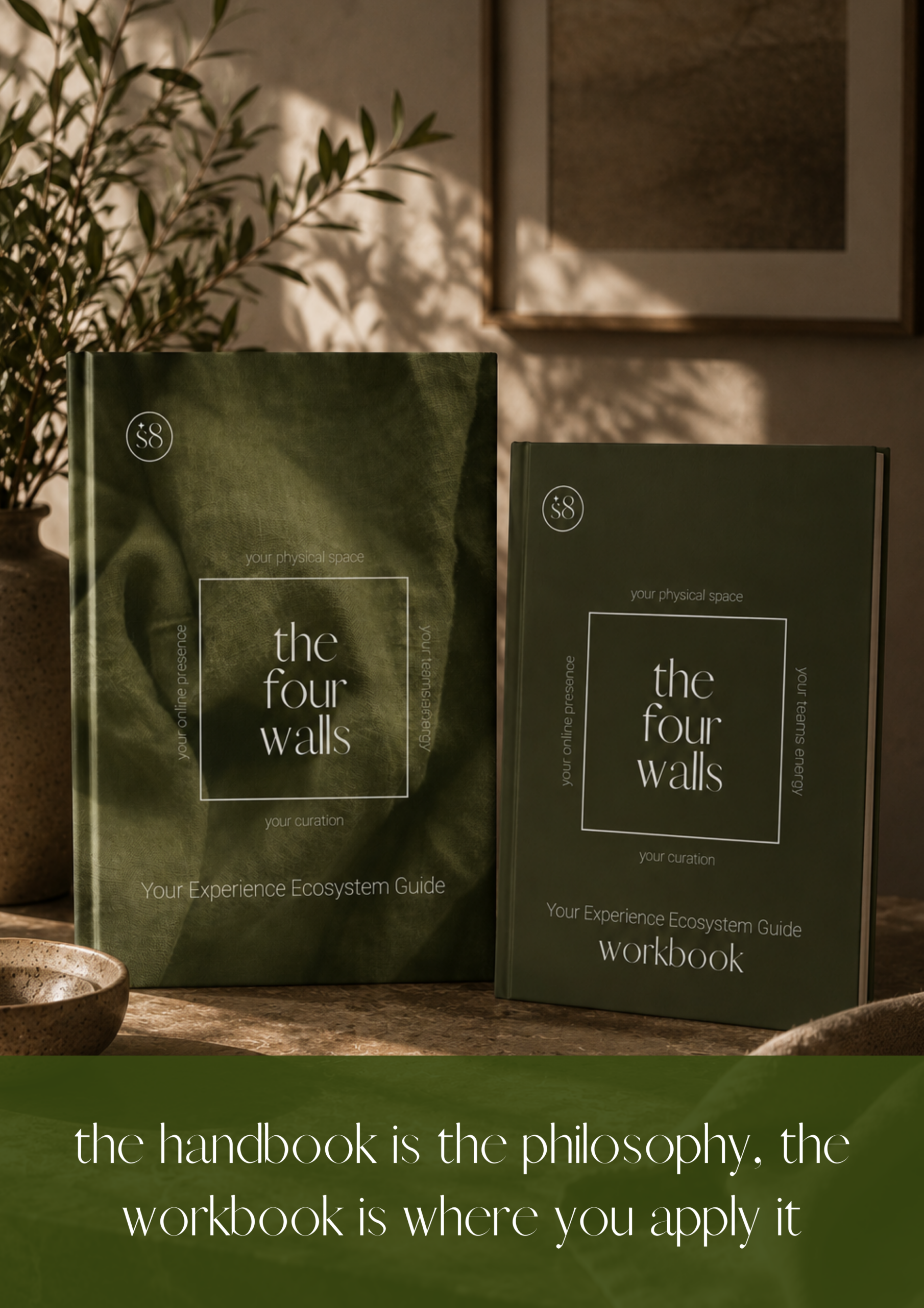 The four walls handbook and workbook standing side by side on a styled shelf